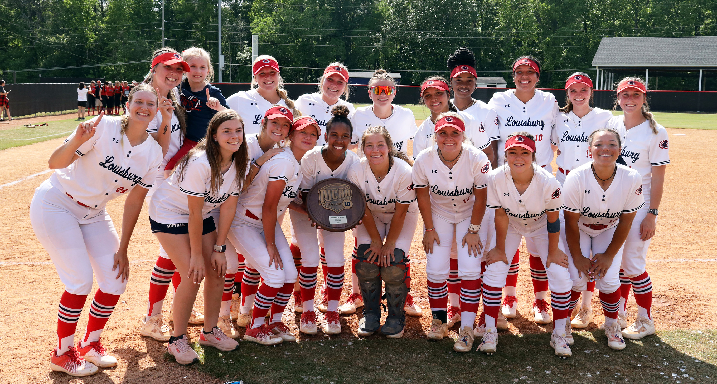 Louisburg College Softball Team with Region X Trophy