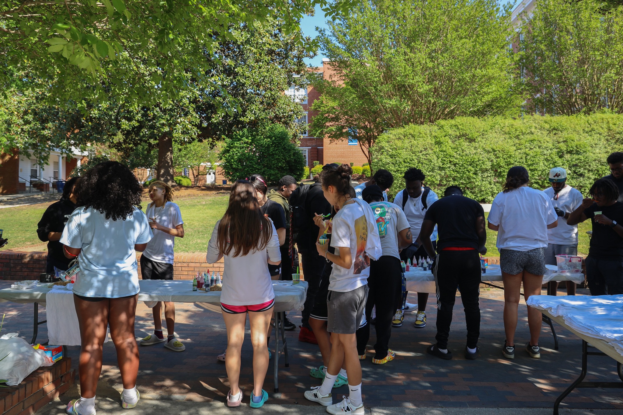 Students participating in the SGA tie dye tshirt event.