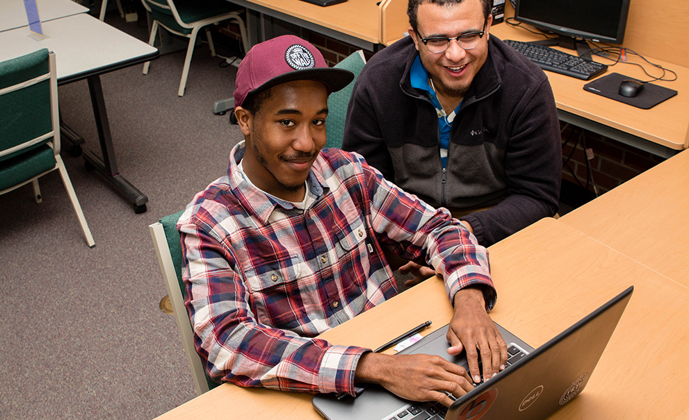 student working on computer