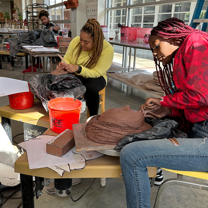 Two students in art class.