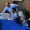 Louisburg College admissions staff are ready to helps students check-in. 